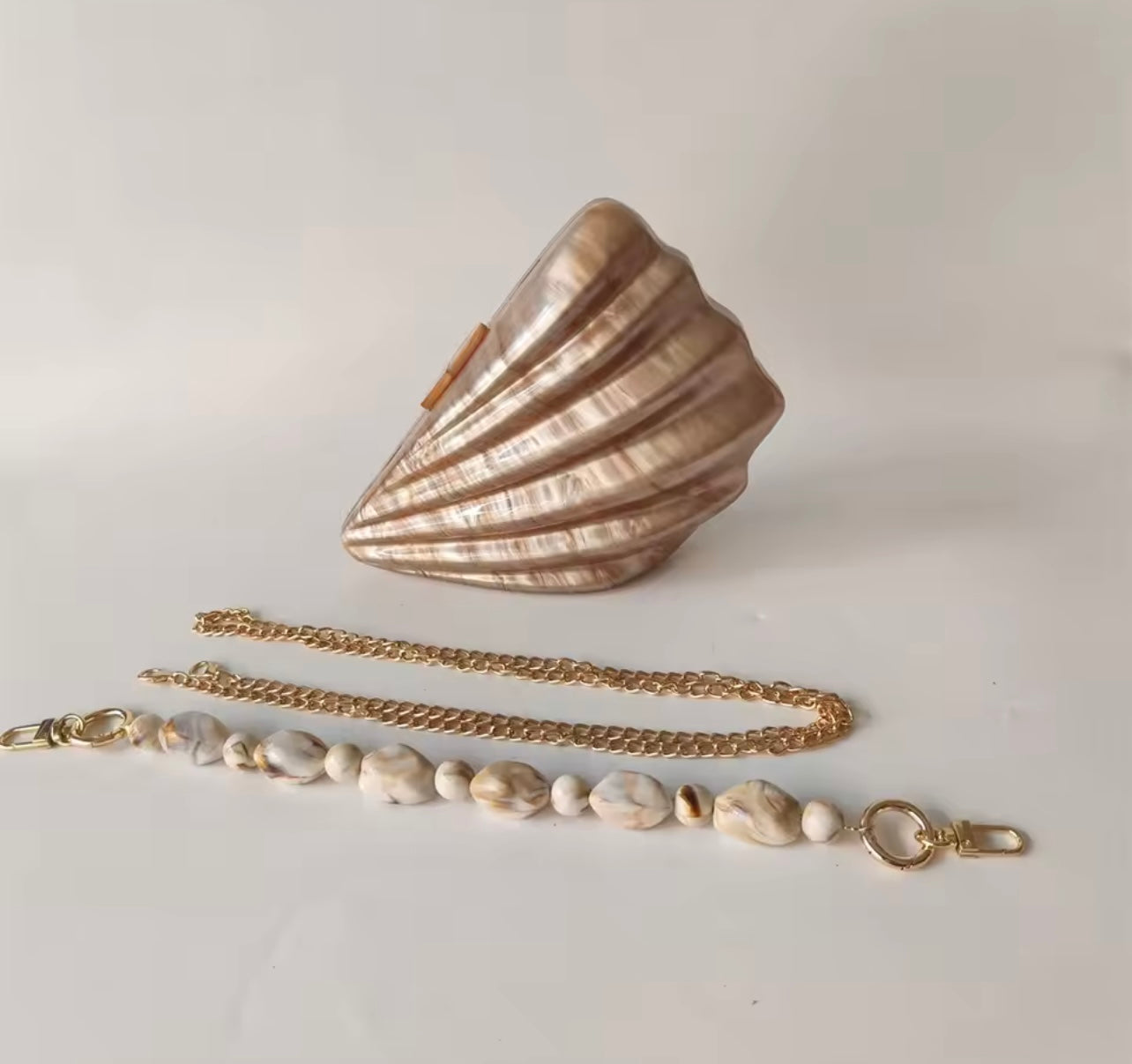 Côte Bronze Shell Clutch