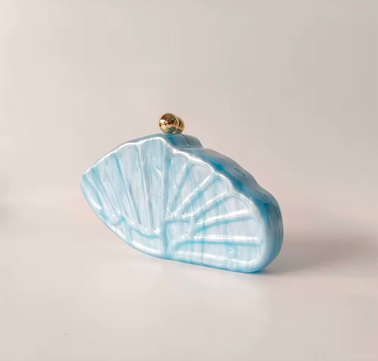 Azure Pearl Saddle Clutch